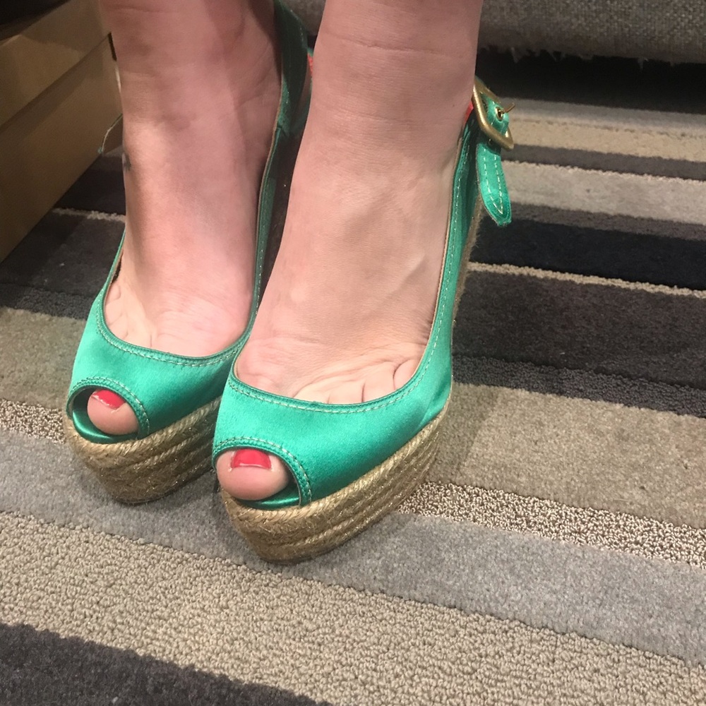 Christian Louboutin satin heeled espadrilles.